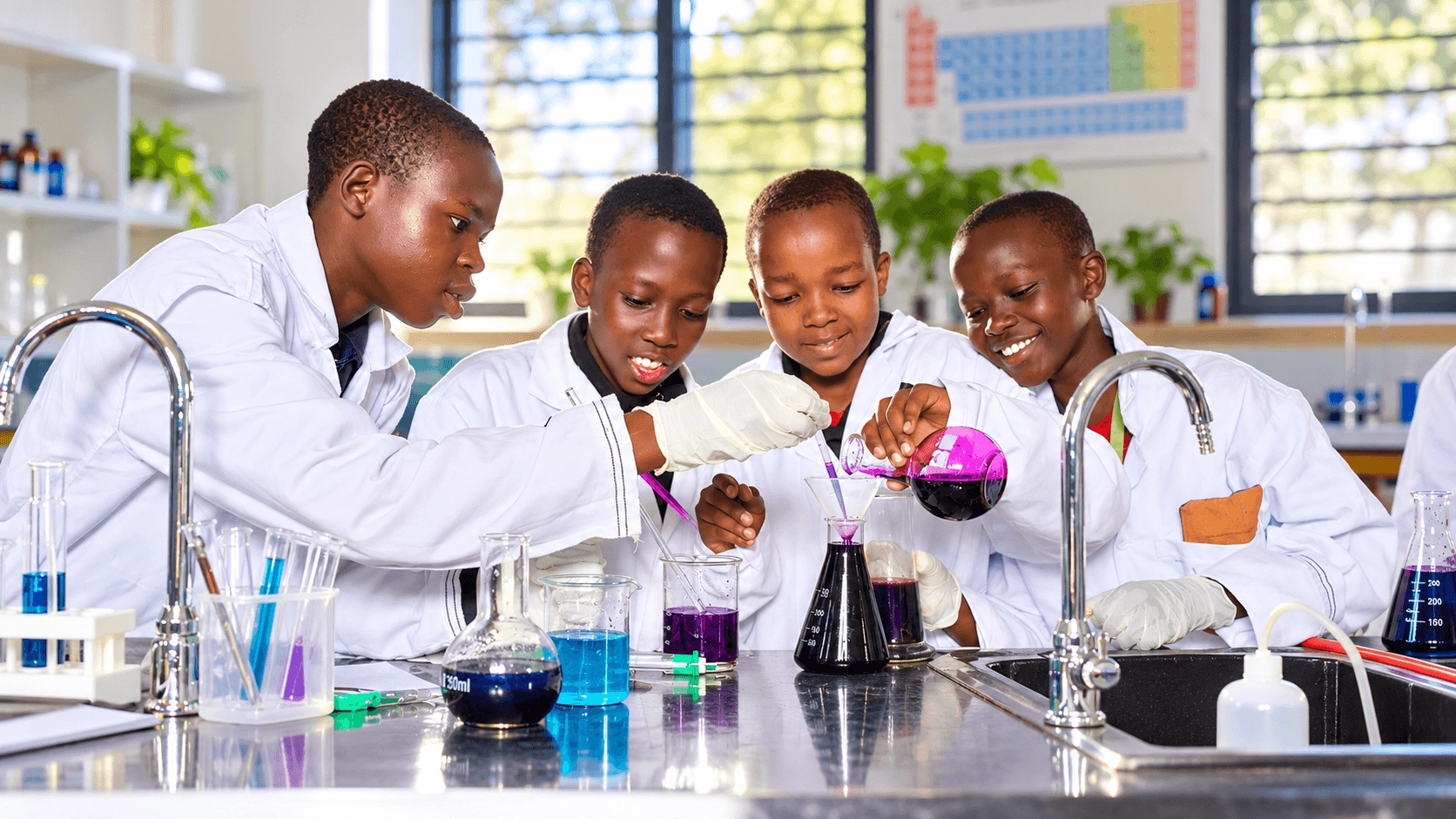 Holystar students conducting science lab experiment